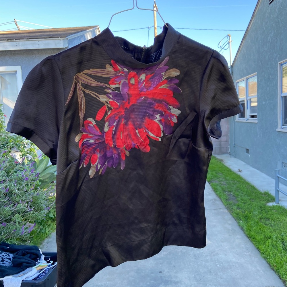 Apostrophe Black Top with Red and Purple Floral Design